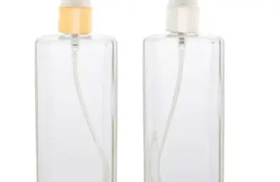 frasco de perfume de vidro transparente com válvula spray dourada e prata