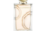 Frasco do perfume Estée Lauder Glimmer em fundo claro