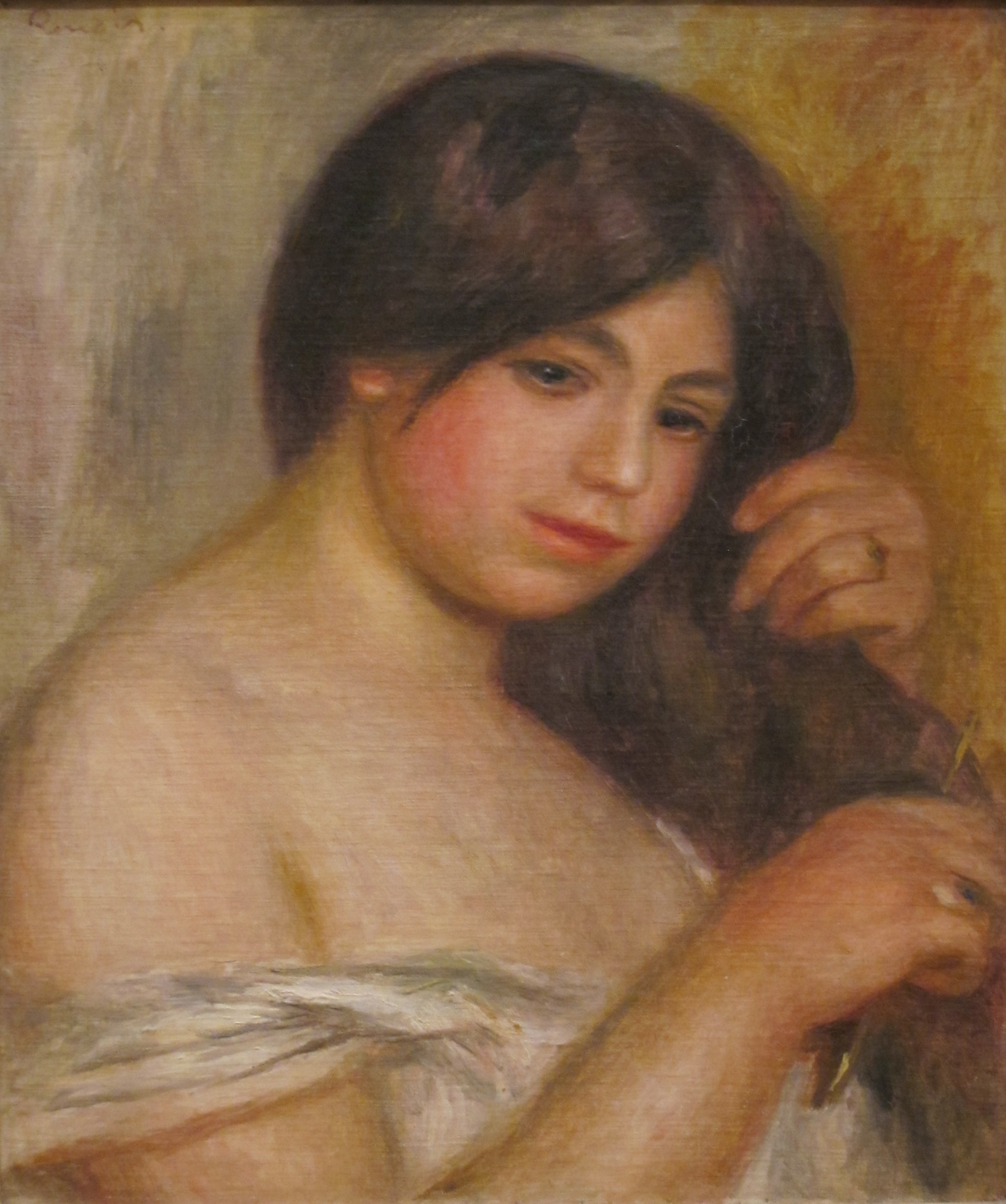 Retrato de mulher com cabelos penteados em obra de Renoir