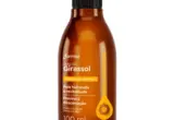 Embalagem do Óleo Corporal de Girassol Farmax 100 ml, frasco âmbar com tampa preta