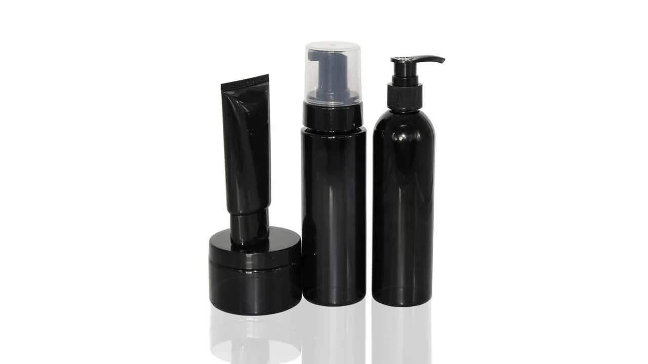 Embalagens cosméticas pretas genéricas com diferentes sistemas de fechamento.